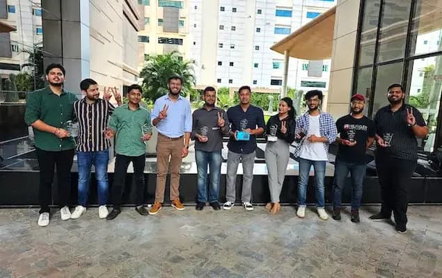 TCZ employees standing together