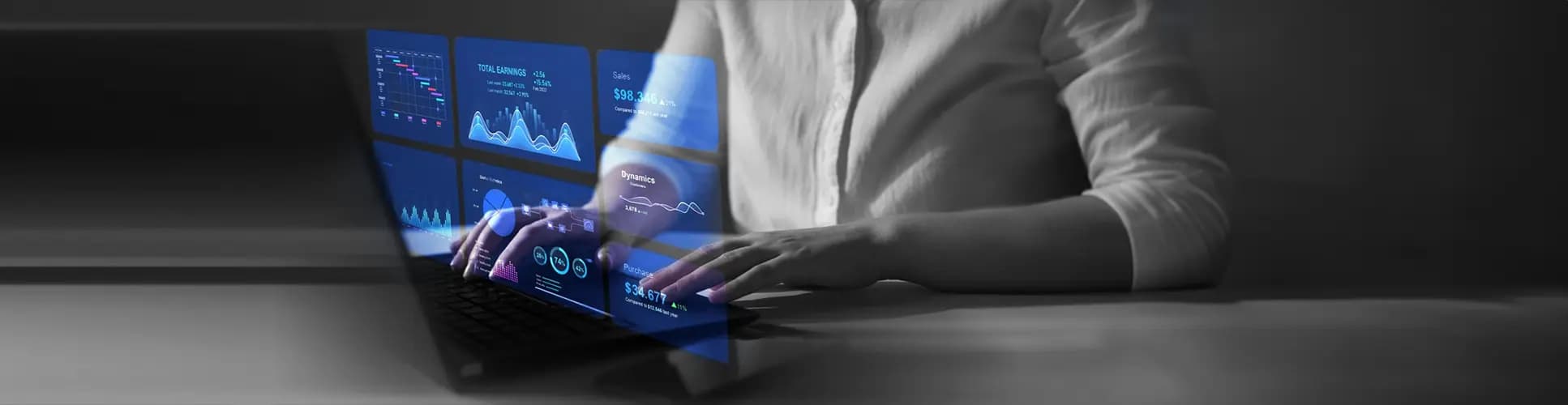 a man watching analytics on a blue screen